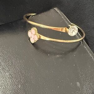 Clover and rhinestone bracelet.